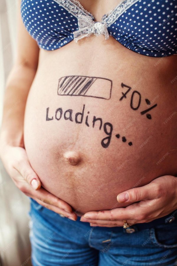 живот беременной