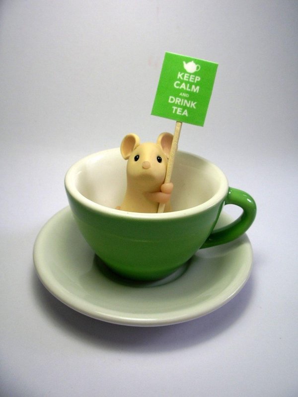 мышка в чашке