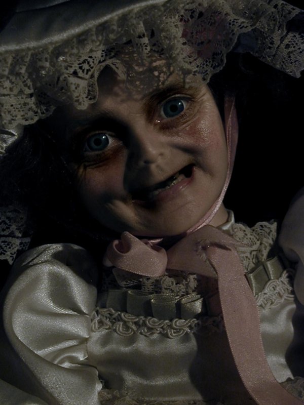 жуткая кукла