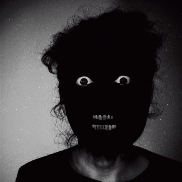 страшное черное лицо